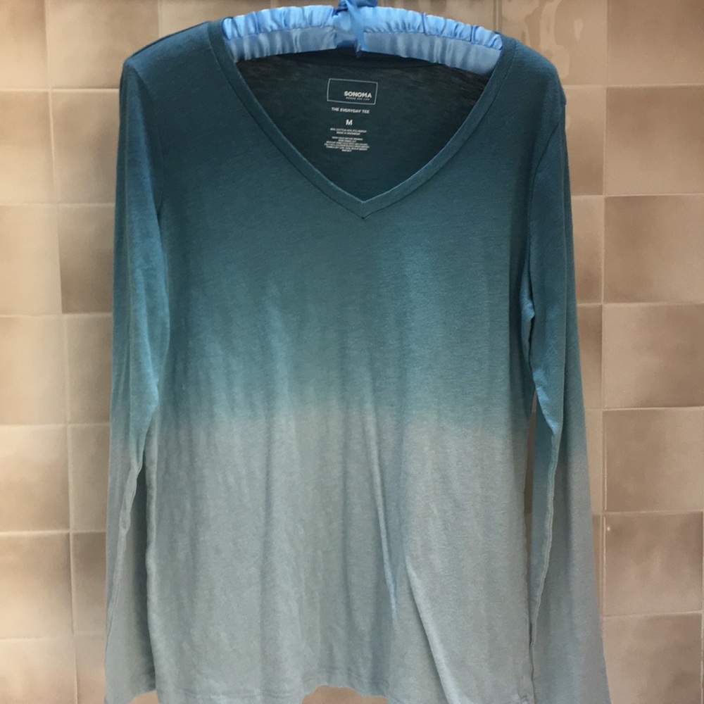 Long sleeved blue shirt
